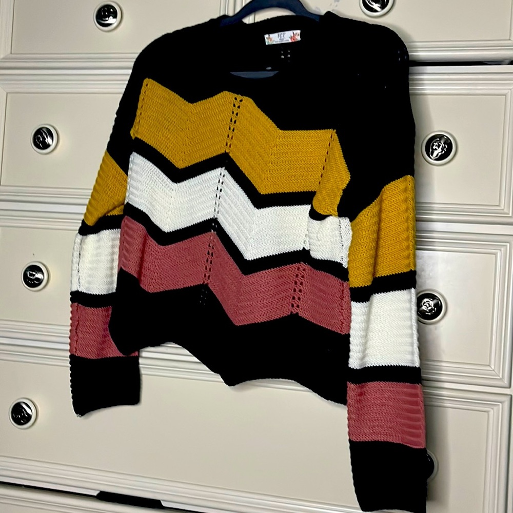 A knitted shirt with different colors very soft and comfortable